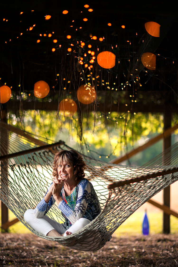 Chloe sitting in hammock